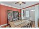 Dining area with warm lighting, white crown molding, and built-in bookshelves at 1408 Bimini Dr, Charleston, SC 29414