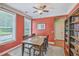 Cozy dining room featuring warm lighting, an area rug, and built-in bookshelves at 1408 Bimini Dr, Charleston, SC 29414