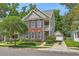 Charming two-story home featuring brick accents, a cozy porch, and a well-manicured lawn at 1408 Bimini Dr, Charleston, SC 29414