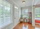 Bright foyer with hardwood floors, a charming curio cabinet, and lots of natural light at 1408 Bimini Dr, Charleston, SC 29414