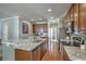 Kitchen features granite countertops, stainless appliances, and ample cabinet space for storage at 1408 Bimini Dr, Charleston, SC 29414