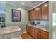 Eat-in kitchen has granite counters, wood cabinets, and stainless appliances at 1408 Bimini Dr, Charleston, SC 29414
