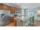 Bright kitchen with stainless appliances, granite countertops, and a spacious island with bar seating at 1408 Bimini Dr, Charleston, SC 29414