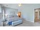 This spacious bedroom features soft, neutral walls, carpet, and an ensuite bathroom for added convenience at 1408 Bimini Dr, Charleston, SC 29414