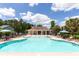 Outdoor community pool with lounge chairs and a bathhouse offers a relaxing recreational space for residents at 1408 Bimini Dr, Charleston, SC 29414