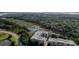 Community aerial view showcasing the marsh and waterways surrounding the property on a sunny day with blue skies at 145 Pier View St # 407, Charleston, SC 29492