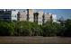 Beautiful multi-story apartments surrounded by lush greenery and marsh grass, offering serene views and a tranquil setting at 145 Pier View St # 407, Charleston, SC 29492
