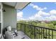 Balcony featuring seating and a view of the town and tree lined area at 145 Pier View St # 407, Charleston, SC 29492