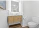 Modern bathroom with floating vanity, sleek fixtures, and contemporary design, providing a minimalist aesthetic at 145 Pier View St # 407, Charleston, SC 29492