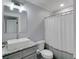 Bathroom featuring granite countertops, bright lighting, and a shower-tub combination at 1543 Scott Hill Rd, James Island, SC 29412