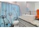 Bathroom featuring a modern vessel sink, a granite countertop, and a stylish shower curtain at 1543 Scott Hill Rd, James Island, SC 29412