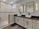 Bright bathroom with double vanity, modern fixtures, vessel sinks, and a glass-enclosed shower at 1543 Scott Hill Rd, James Island, SC 29412