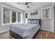 Bright bedroom with large windows, a comfortable bed, and a serene atmosphere for relaxation at 1543 Scott Hill Rd, James Island, SC 29412