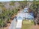 Stunning home with manicured lawn, showcasing its inviting curb appeal and well-maintained exterior at 1543 Scott Hill Rd, James Island, SC 29412