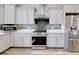 Stylish kitchen featuring granite counters, stainless steel appliances, and ample cabinet space at 1543 Scott Hill Rd, James Island, SC 29412