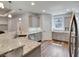 Modern kitchen featuring granite countertops, gray cabinetry, and stainless steel appliances at 1543 Scott Hill Rd, James Island, SC 29412