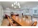 Open concept living space featuring a fireplace, kitchen, and dining area at 1543 Scott Hill Rd, James Island, SC 29412