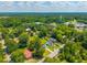 Aerial shot of the property nestled in a serene neighborhood with a water tower in the background at 171 N Main St, Ridgeville, SC 29472