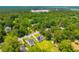 Picturesque aerial view of the home and its peaceful surroundings, industrial area in background at 171 N Main St, Ridgeville, SC 29472