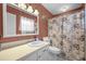 Bathroom with sink and vanity, toilet, and shower curtain at 171 N Main St, Ridgeville, SC 29472