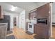Classic kitchen features abundant cabinet space, essential appliances, and a walk-in pantry at 171 N Main St, Ridgeville, SC 29472