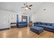 Bright living room with vaulted ceilings, hardwood floors, and comfortable seating at 171 N Main St, Ridgeville, SC 29472