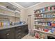 Well-organized pantry with ample shelving and storage solutions for food and kitchen essentials at 171 N Main St, Ridgeville, SC 29472