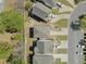 Bird's eye view of homes showing driveways, backyard landscaping, and mature trees at 1800 Poplar Grove Pl, Summerville, SC 29483