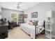 Bright bedroom with neutral paint and large window for natural light at 1813 Parkland Preserve Ln, Charleston, SC 29412