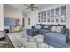 Cozy living room featuring a comfortable blue sectional sofa and a stylish rug at 1821 Mead Ln, Johns Island, SC 29455