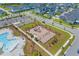 Aerial view of a community park with playgrounds, lush landscaping, and parking at 1828 Agate Bay Dr, Mount Pleasant, SC 29466