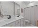 Elegant bathroom featuring double vanity with matte black faucets and shower with patterned curtain at 1828 Agate Bay Dr, Mount Pleasant, SC 29466