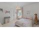Bright bedroom featuring a whimsical princess-themed comforter and a woven pendant light at 1828 Agate Bay Dr, Mount Pleasant, SC 29466