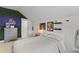 Upstairs bedroom with a geometric duvet cover and a fun ivy wall at 1828 Agate Bay Dr, Mount Pleasant, SC 29466