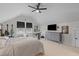 Upstairs bedroom with a ceiling fan, a mounted television, and neutral carpeting at 1828 Agate Bay Dr, Mount Pleasant, SC 29466