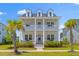 Charming two-story home with a double porch and lush landscaping at 1828 Agate Bay Dr, Mount Pleasant, SC 29466