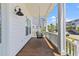 Inviting front porch with a porch swing at 1828 Agate Bay Dr, Mount Pleasant, SC 29466
