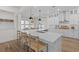 Bright kitchen featuring a large island with quartz countertop, stainless steel appliances and eat-in dining at 1828 Agate Bay Dr, Mount Pleasant, SC 29466
