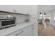Kitchen featuring quartz counters, subway tile backsplash, and stainless steel appliances at 1828 Agate Bay Dr, Mount Pleasant, SC 29466