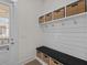 Mudroom featuring storage, a bench with storage underneath, and a door to the outside patio at 1828 Agate Bay Dr, Mount Pleasant, SC 29466