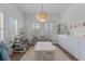 Bright playroom with lots of sunlight, storage, and play furniture at 1828 Agate Bay Dr, Mount Pleasant, SC 29466