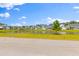 Scenic pond view surrounded by well-manicured lawns and lush landscaping at 1828 Agate Bay Dr, Mount Pleasant, SC 29466