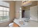 Bright bathroom with a large vanity and window at 183 Cypress Forest Dr, Moncks Corner, SC 29461