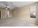 Spacious bedroom featuring neutral carpeting, a vaulted ceiling, and a bright window at 183 Cypress Forest Dr, Moncks Corner, SC 29461