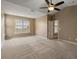 Bright carpeted bedroom with large windows at 183 Cypress Forest Dr, Moncks Corner, SC 29461