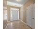 Inviting entryway featuring tile floors, a white front door with sidelights, and neutral paint at 183 Cypress Forest Dr, Moncks Corner, SC 29461
