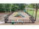 Fenced playground area with colorful equipment, perfect for outdoor activities at 183 Cypress Forest Dr, Moncks Corner, SC 29461