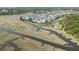 Beautiful aerial of townhome community surrounded by marshlands and waterways at 185 Winding River Dr, Johns Island, SC 29455