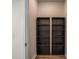 Walk in pantry with sleek black built-in shelving that offers ample storage space at 185 Winding River Dr, Johns Island, SC 29455