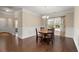 Cozy dining room featuring hardwood floors, elegant lighting, and a bright window at 207 Brutus Ln, Summerville, SC 29485